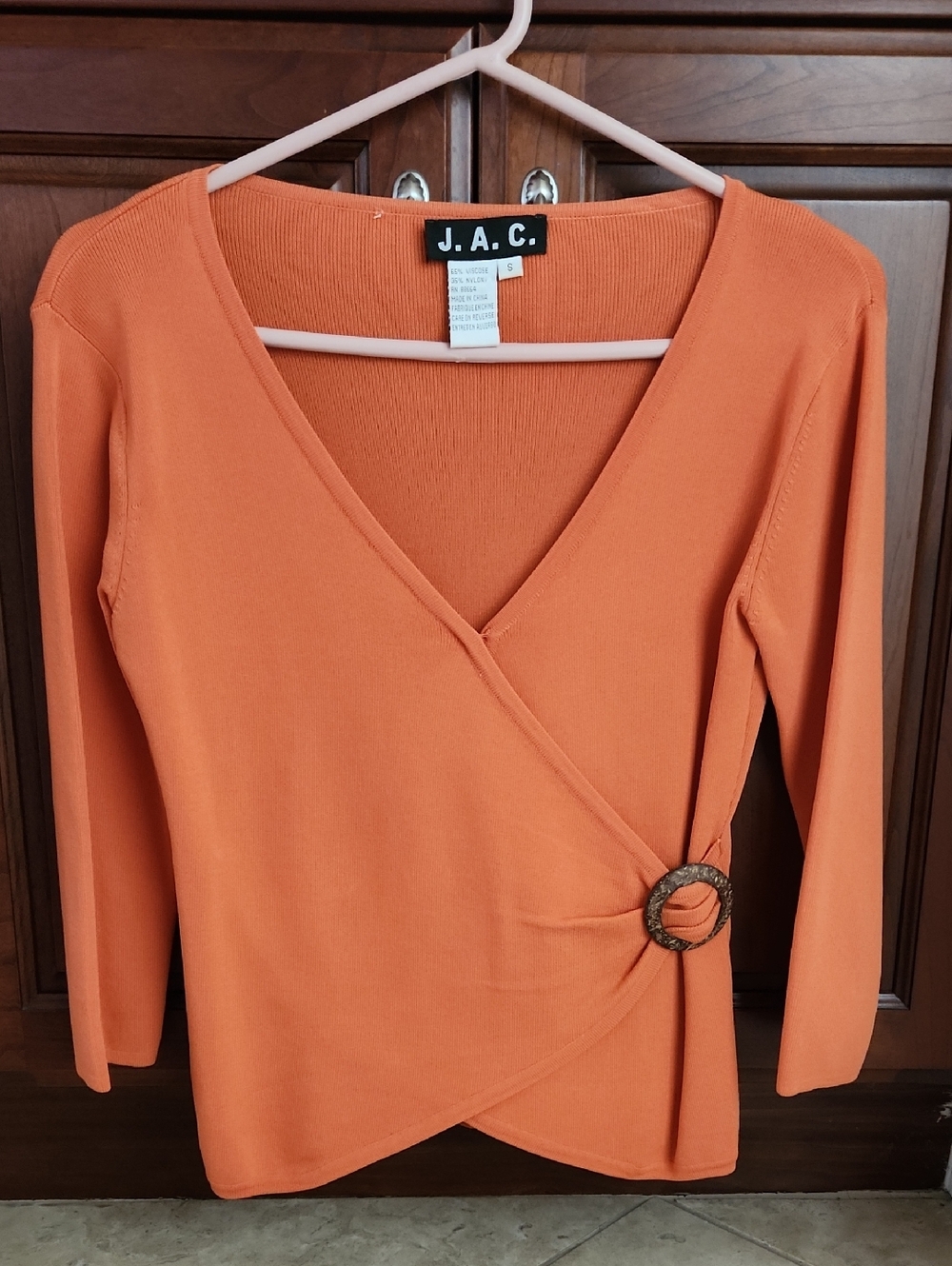 Women's Orange Wrap-Style Knit Top